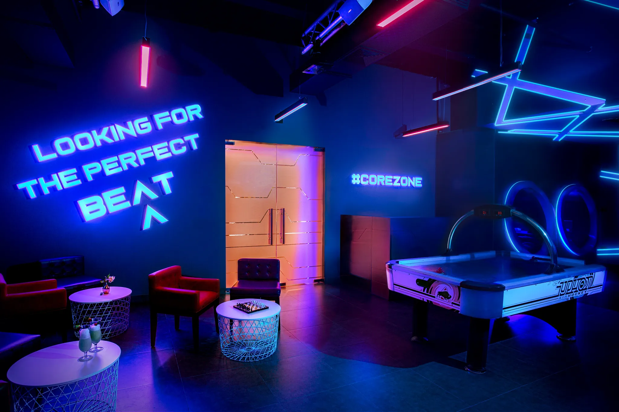 Core Zone Teens Bar at Dreams Royal Beach Punta Cana featuring a vibrant teen lounge with refreshments, games, and a casual social atmosphere.