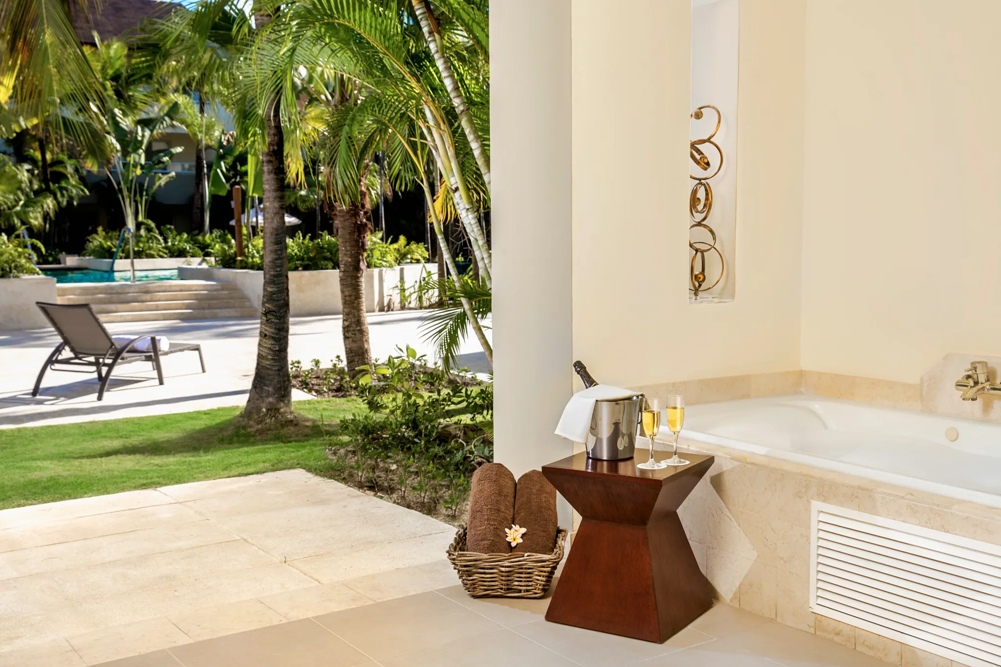 Deluxe Pool View terrace with outdoor hot tub and pool access at Dreams Royal Beach Punta Cana.