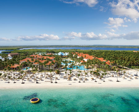 Dreams Palm Beach Punta Cana all-inclusive resort with tropical pools, palm trees, and beachfront setting in the Dominican Republic.