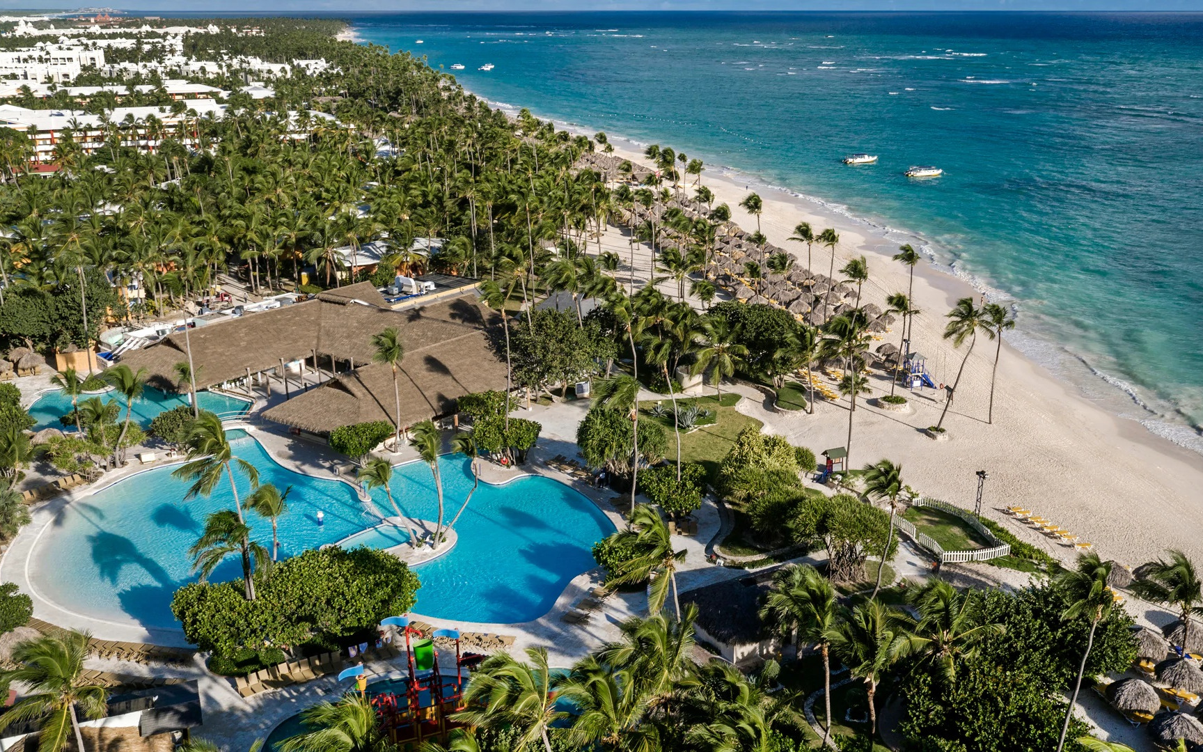 Iberostar Selection Bavaro Suites all-inclusive resort in Punta Cana with expansive pools, beachfront access, and family-friendly amenities.