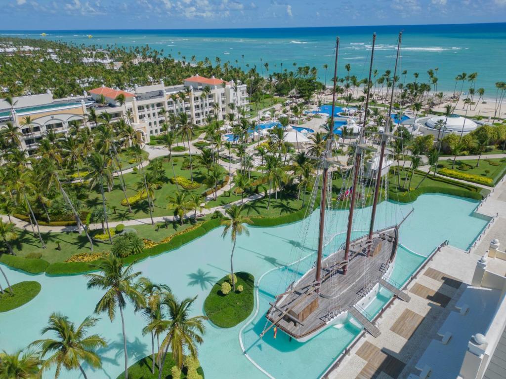 JOIA Bavaro by Iberostar adults-only all-inclusive resort with modern design, beachfront pools, and upscale dining in Punta Cana.