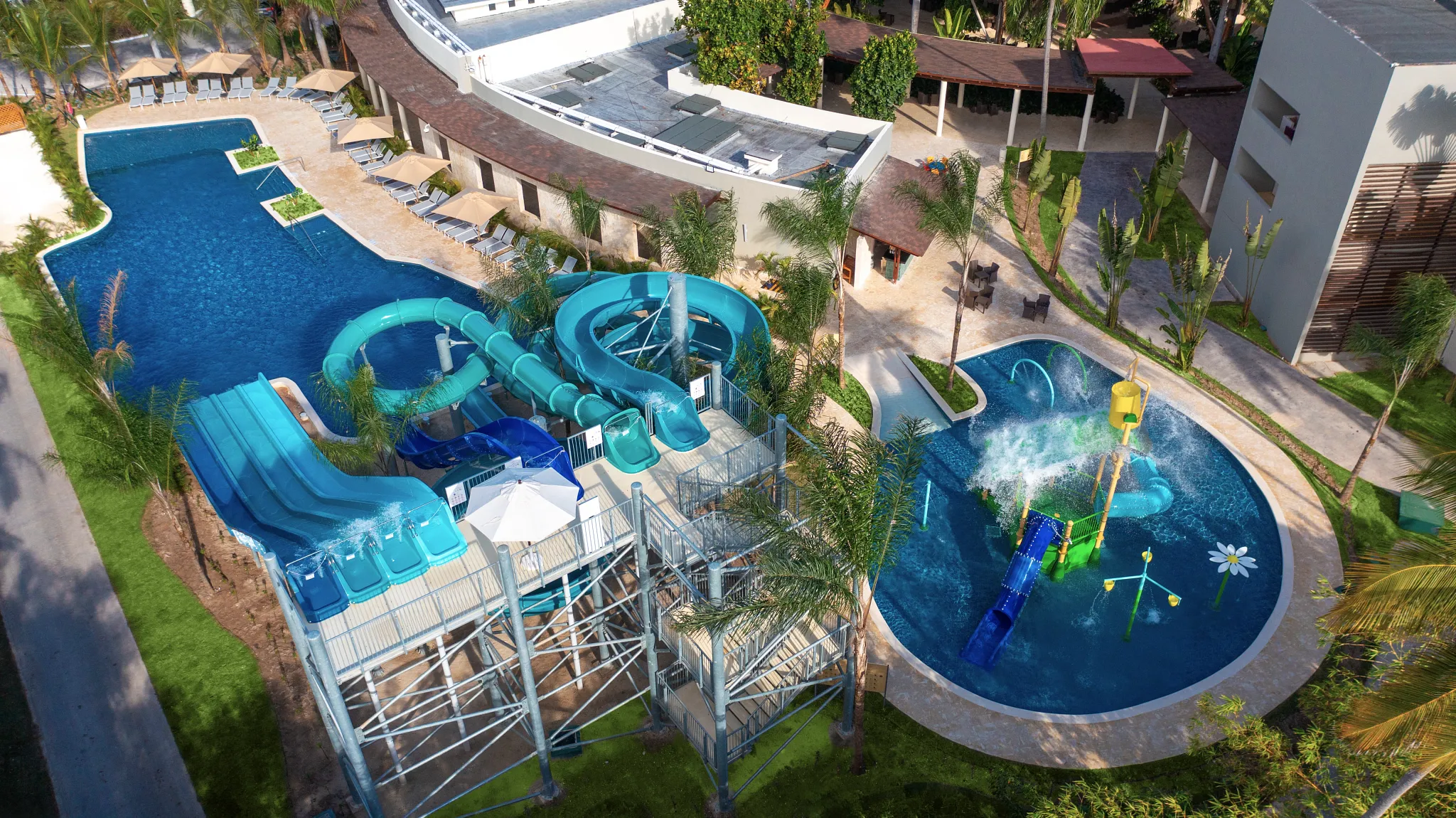 Splash playground with small slides and water features for kids at Dreams Royal Beach Punta Cana.