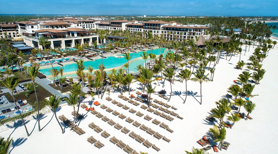 Lopesan Costa Bavaro Resort Spa and Casino mega-resort in Punta Cana with expansive pools, modern architecture, and beachfront access.