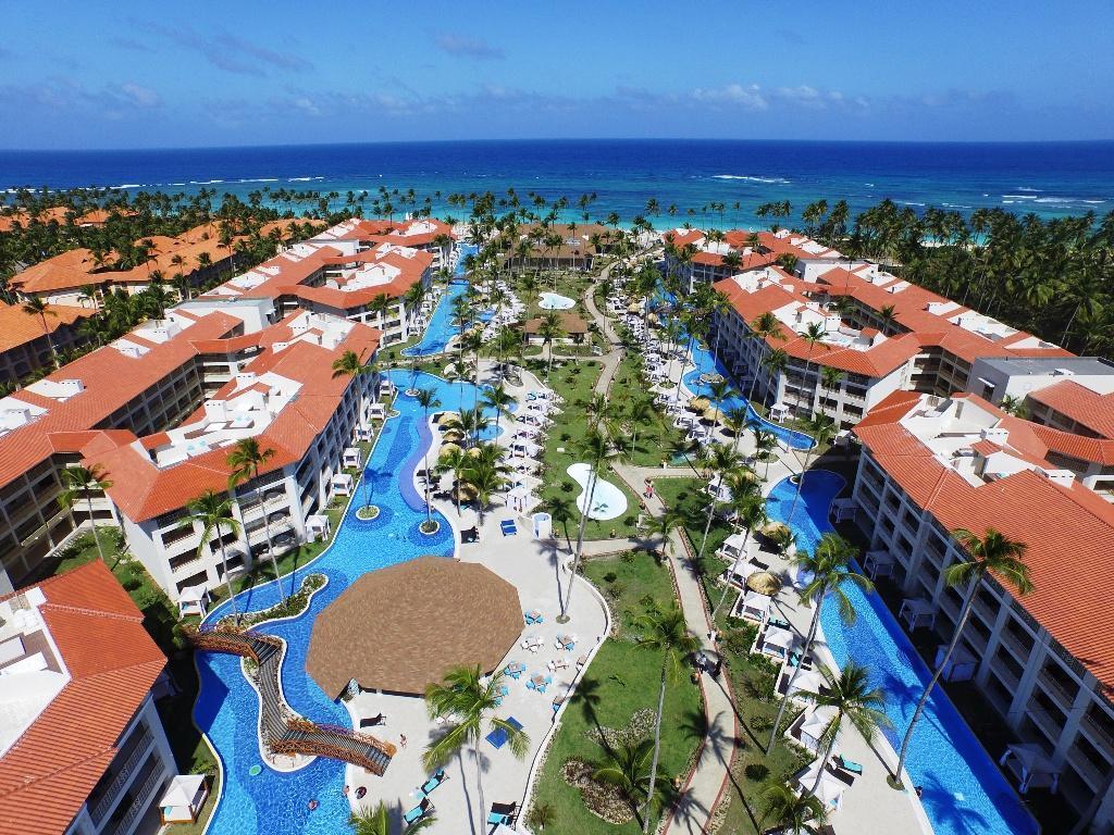 Majestic Mirage Punta Cana all-suite luxury resort with expansive pools, beachfront setting, and modern architecture in the Dominican Republic.
