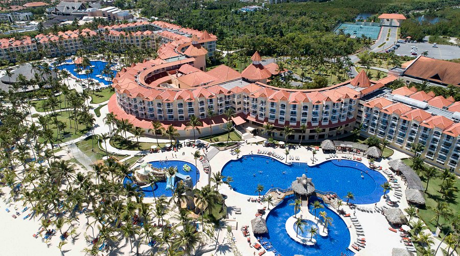 Occidental Caribe Punta Cana all-inclusive resort with beachfront pools, tropical gardens, and family-friendly amenities in the Dominican Republic.