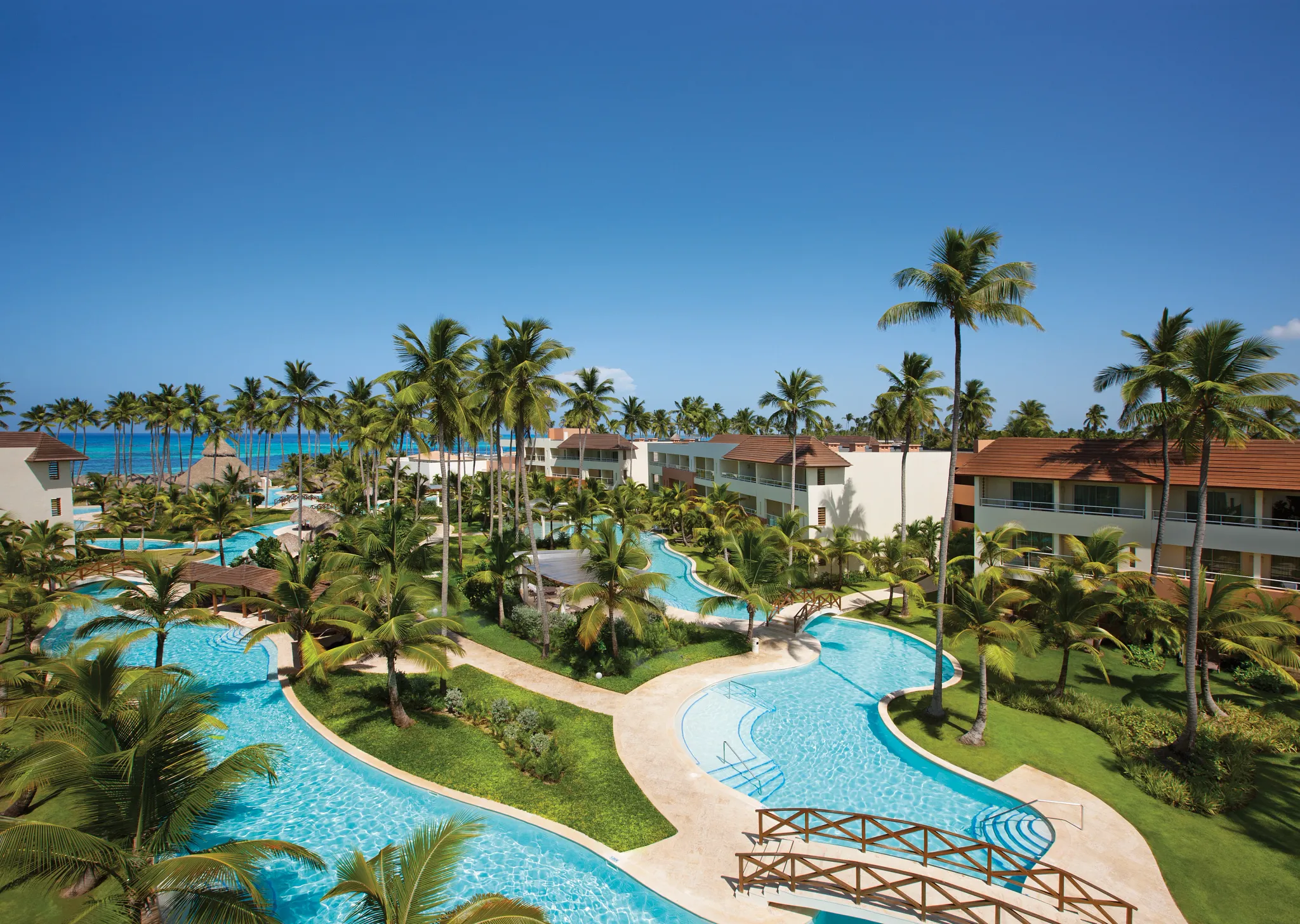 Aerial view of pools leading toward the beach at Dreams Royal Beach Punta Cana.