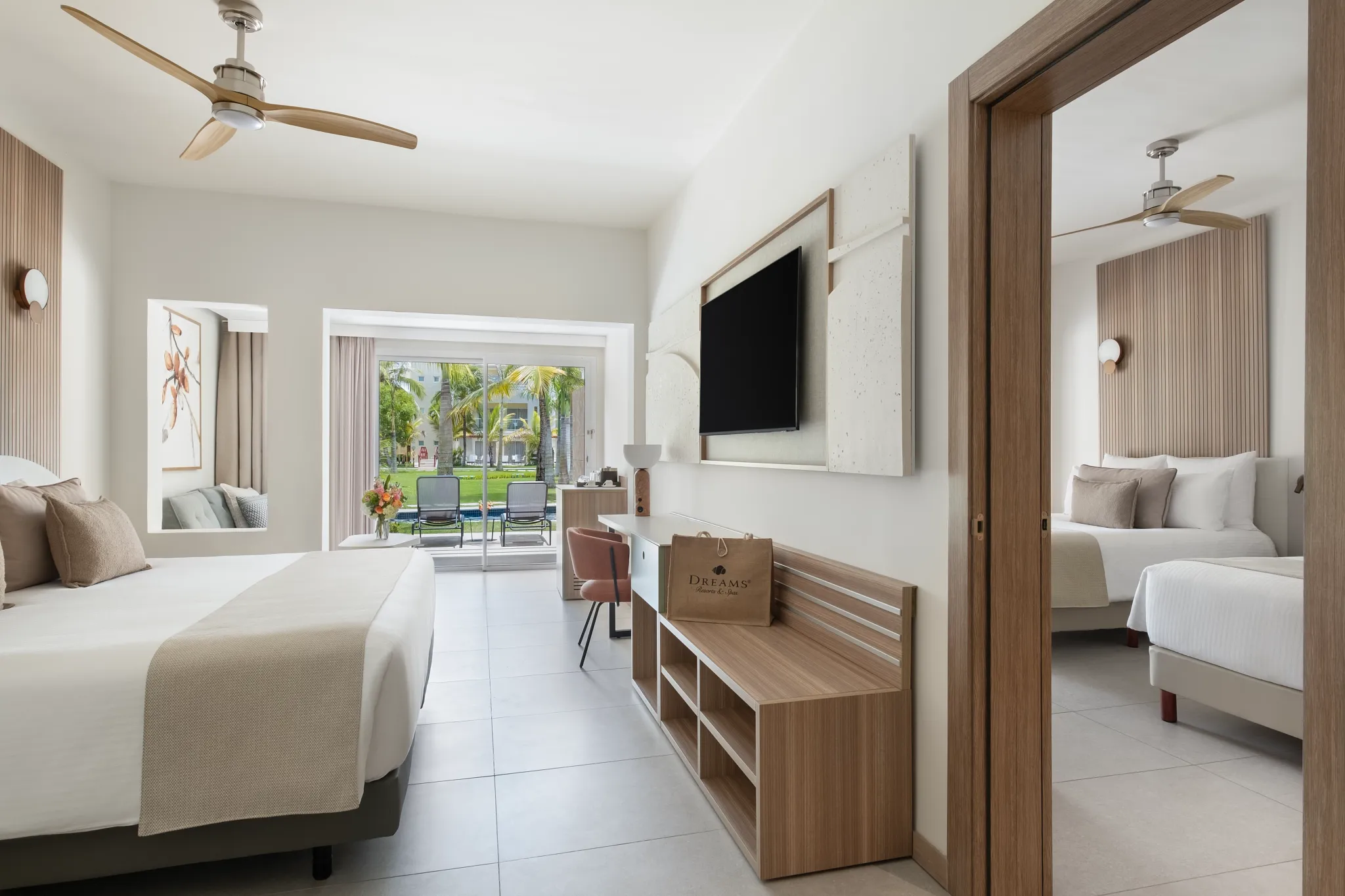 Preferred Club Family Junior Suite Pool Terrace with connecting rooms and king bedroom at Dreams Royal Beach Punta Cana.